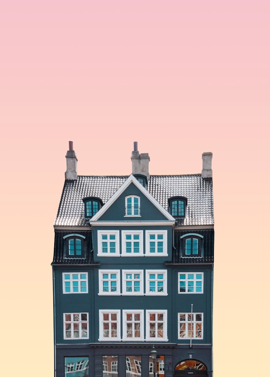 Photo by Simone Hutsch - AssistedKin blue and white 4-storey structure miniature